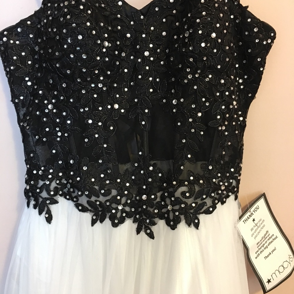 Brand new with tag Blondie prom dress.